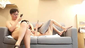 The bespectacled young man fights with two beautiful and charming young women in a 3P cross-fuck and takes turns. The most exciting thing is that the young man asks the young woman to take off her fishnet stockings and put them on himself before having sex